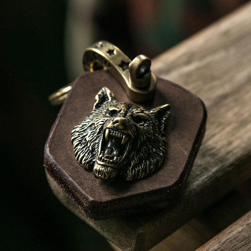 Handcrafted leather heavy metal motorcycle keychain with decorative metal accents, from Bean's Moto Booth.