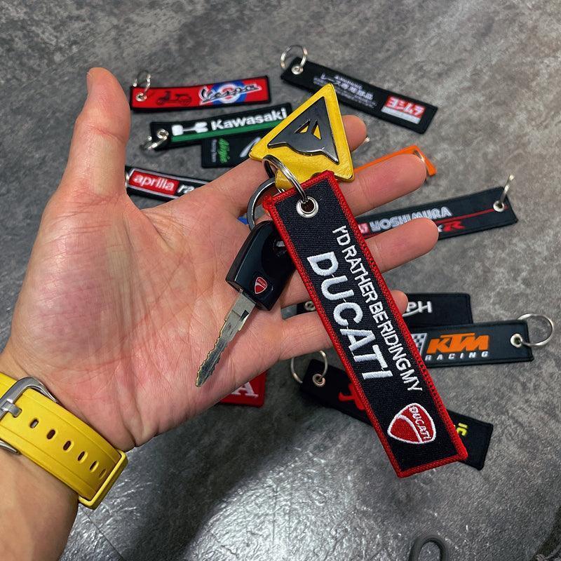 Embroidered motorcycle keychain decor from Bean's Moto Booth featuring detailed motorcycle design and vibrant stitching.