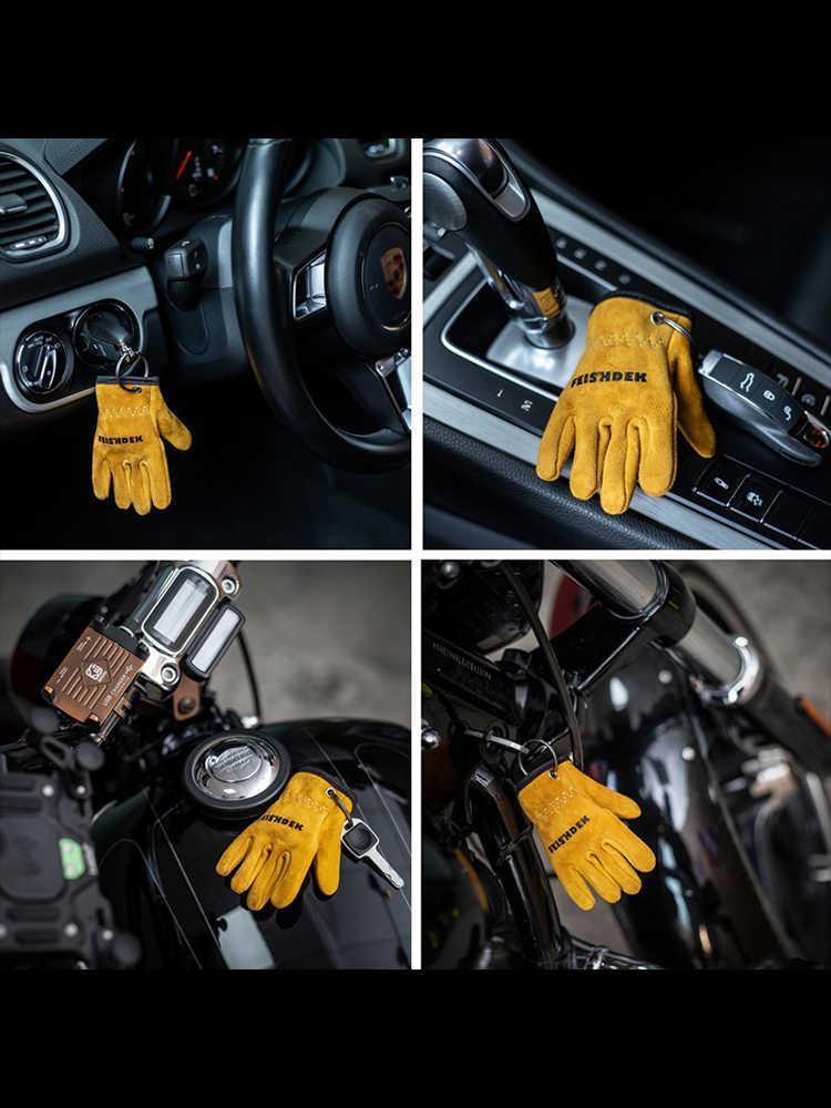 Vintage handcrafted leather motorcycle glove keychain by Bean's Moto Booth, featuring detailed leather decor with a rugged motorcycle style.