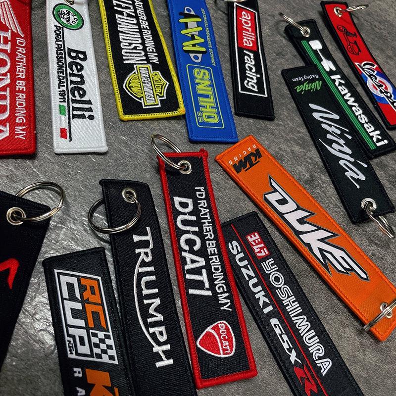 Motorcycle-themed embroidered keychain decor by Bean's Moto Booth featuring detailed motorcycle graphics and vibrant embroidery.