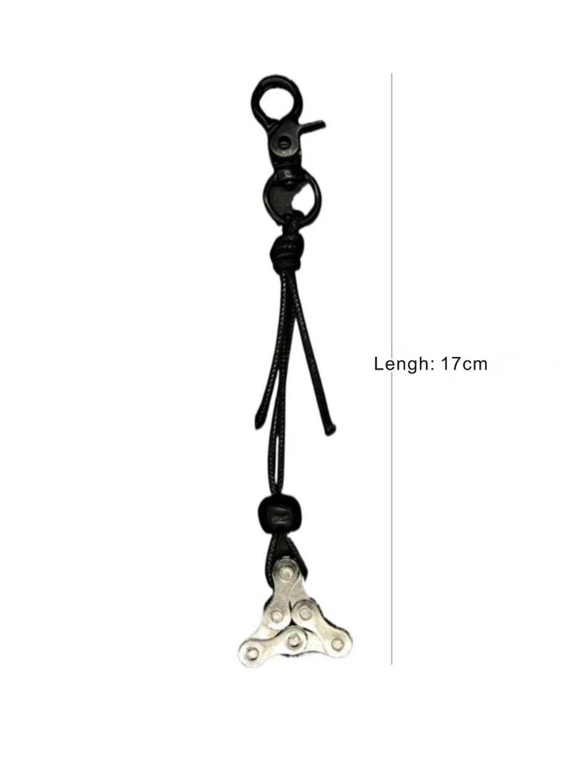 Motorcycle chain keychain decor by Bean's Moto Booth featuring a detailed metal chain design.