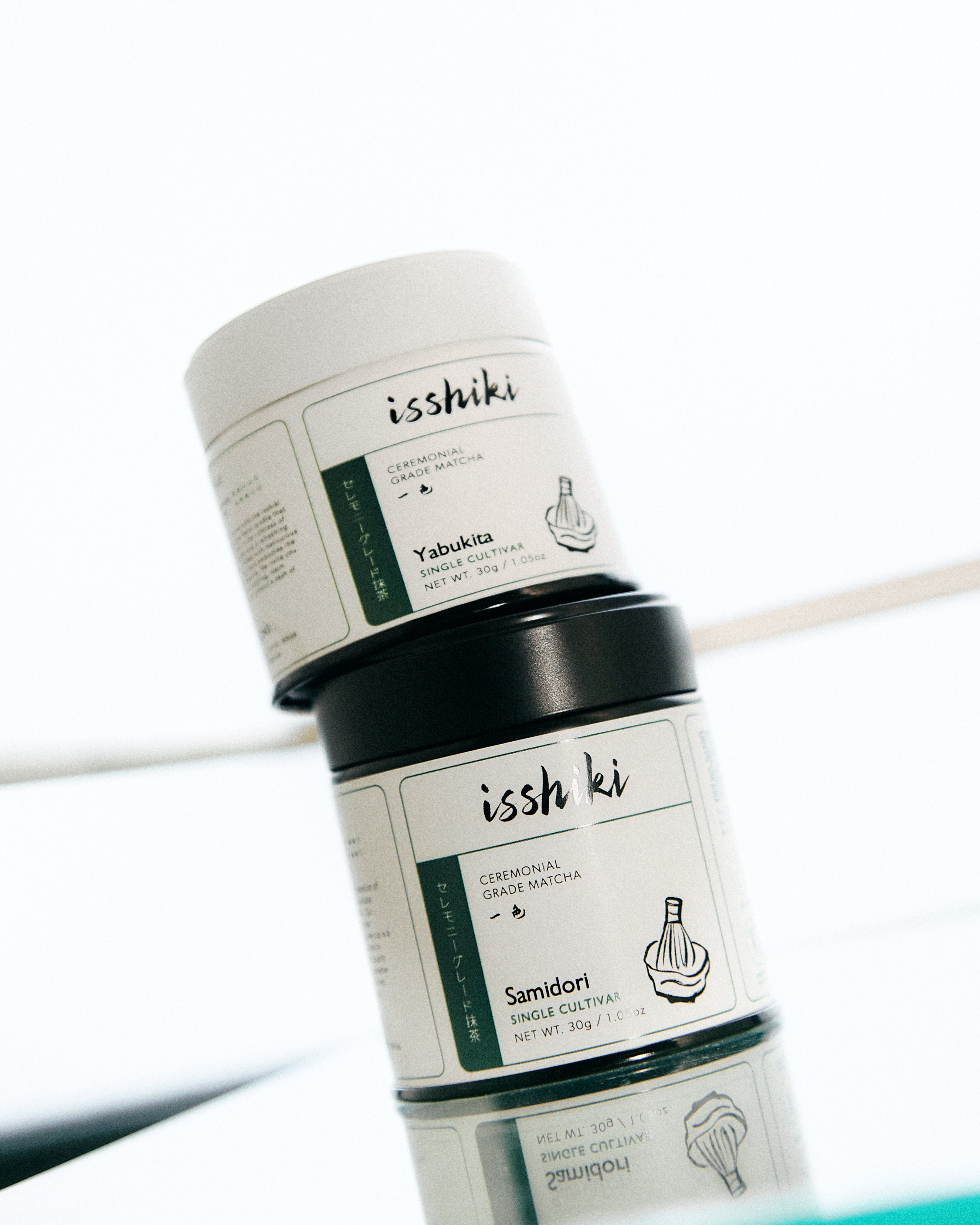 Fine green powder of isshiki matcha premium single cultivar matcha powder, shown in a close-up shot.
