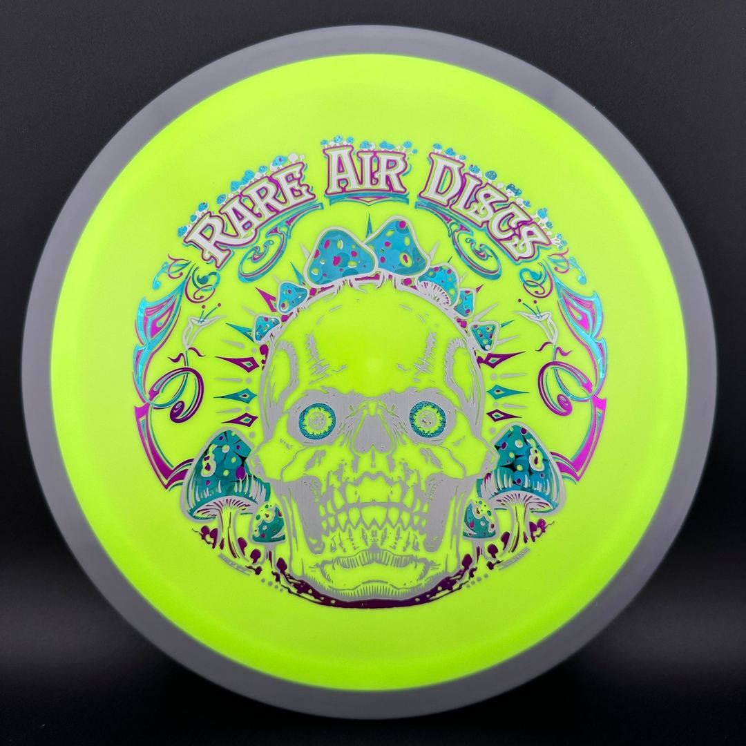 Rare Air Discs Fission Defy Crushin' Amanitas VIP 2.0 disc golf disc with vibrant design and detailed stamp artwork.