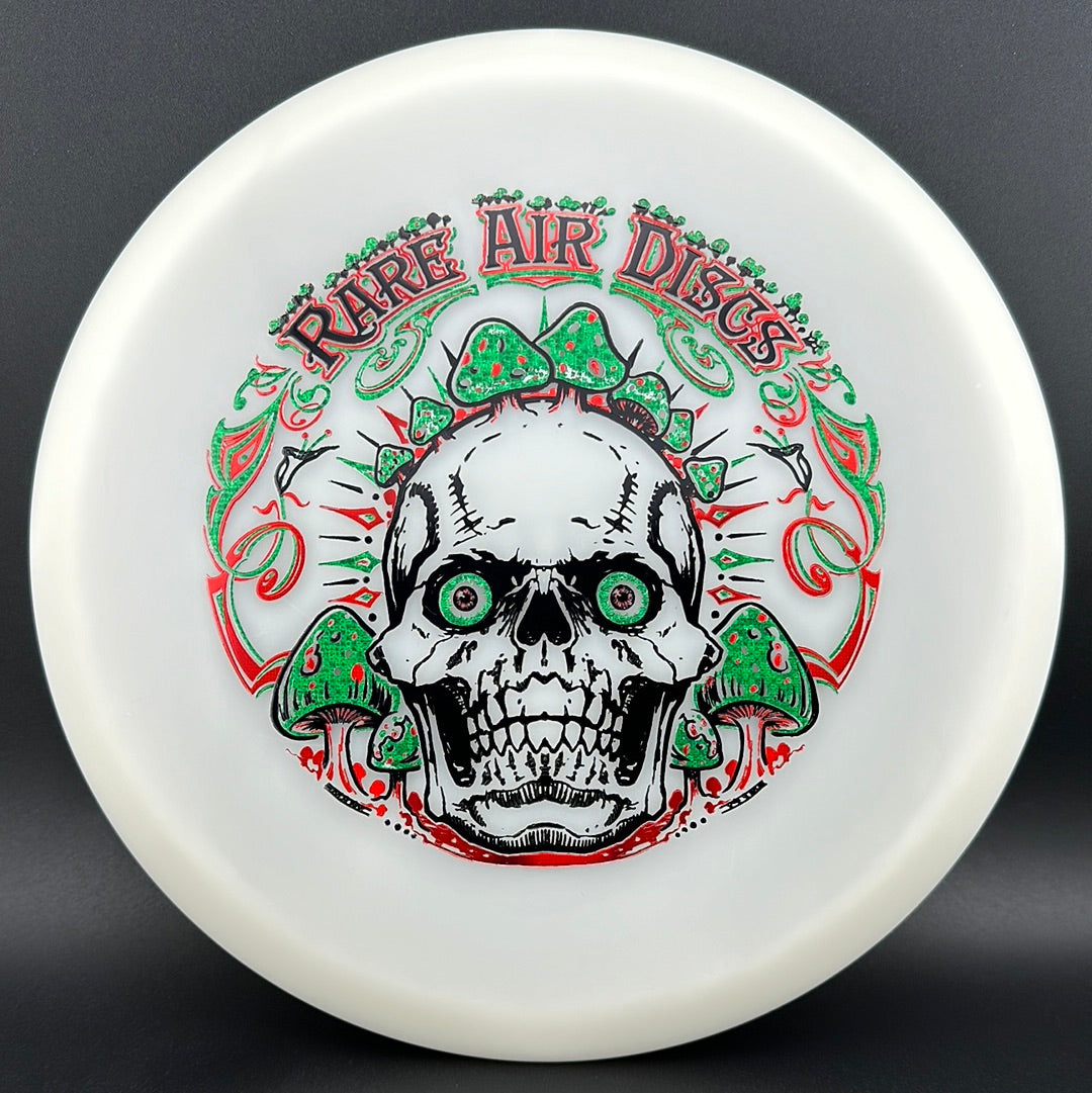 Forged Radiant Supra disc golf stamp by Manny Trujillo on Rare Air Discs, featuring a detailed Crushin' Amanitas design.