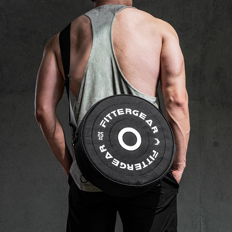 Barbell-shaped Bean's Moto Booth gym bag designed for motorcycle riders, featuring a sturdy, stylish design with multiple compartments.
