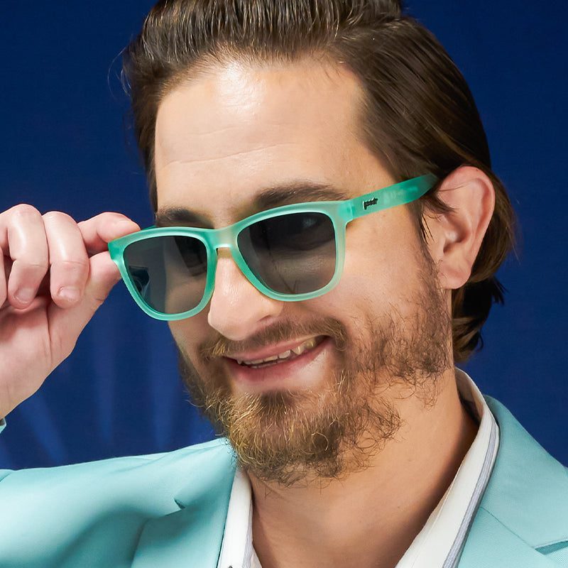 Rare Air Discs Dinner Mint Debauchery OG polarized sunglasses with mint green frames and dark lenses, stylish accessories for outdoor wear.