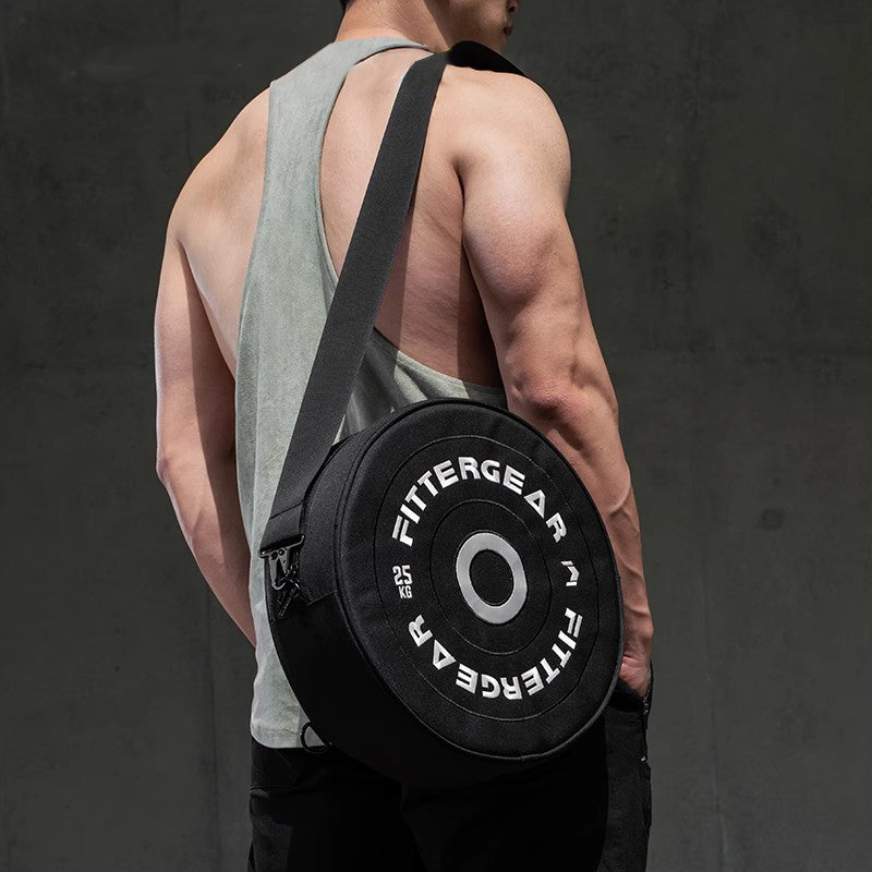 Bean's Moto Booth barbell-shaped gym bag designed as a motorcycle bag with sturdy straps and a compact, sporty appearance.