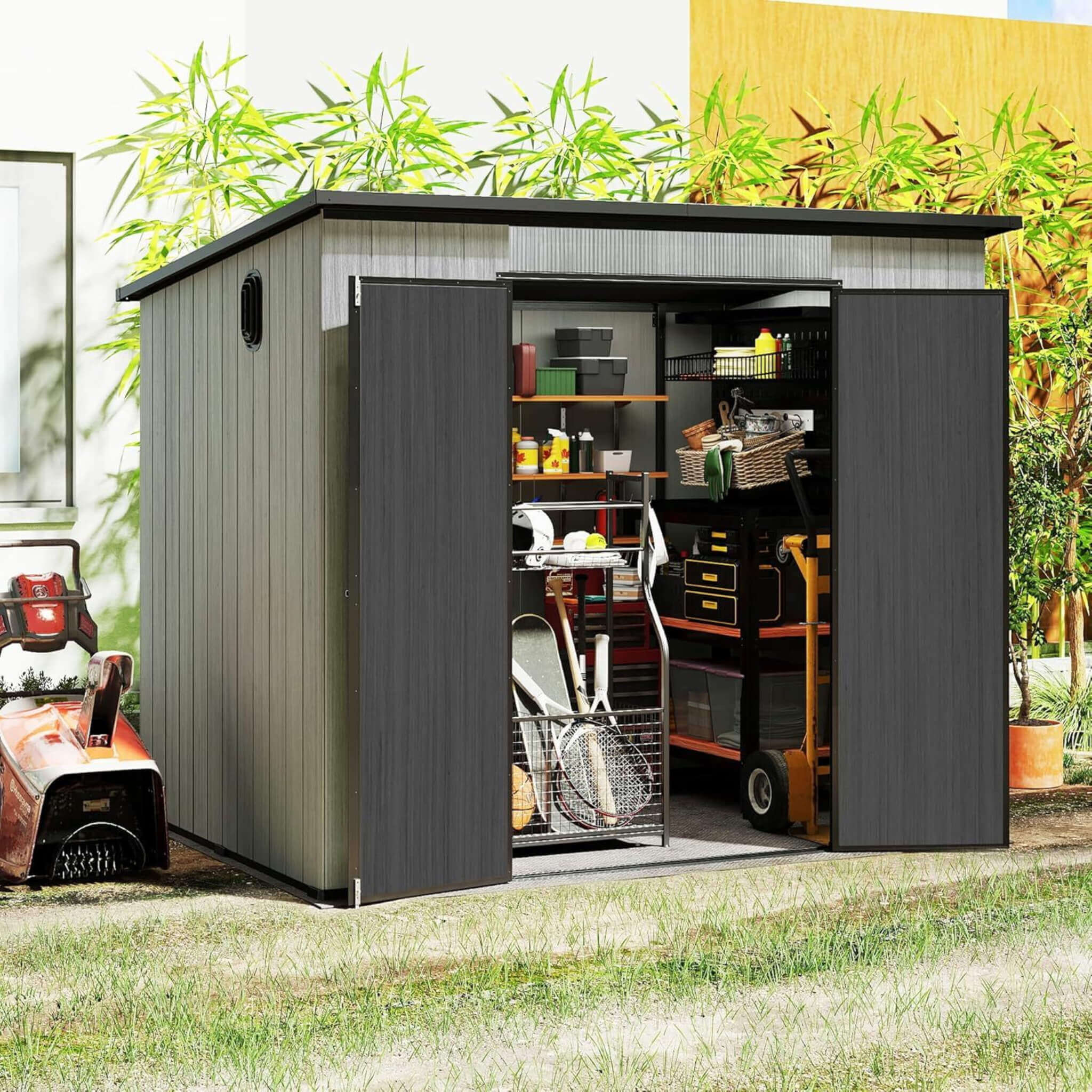 Inside view of the 06x08ft Alora outdoor resin storage shed with lockable double doors and sloping roof.