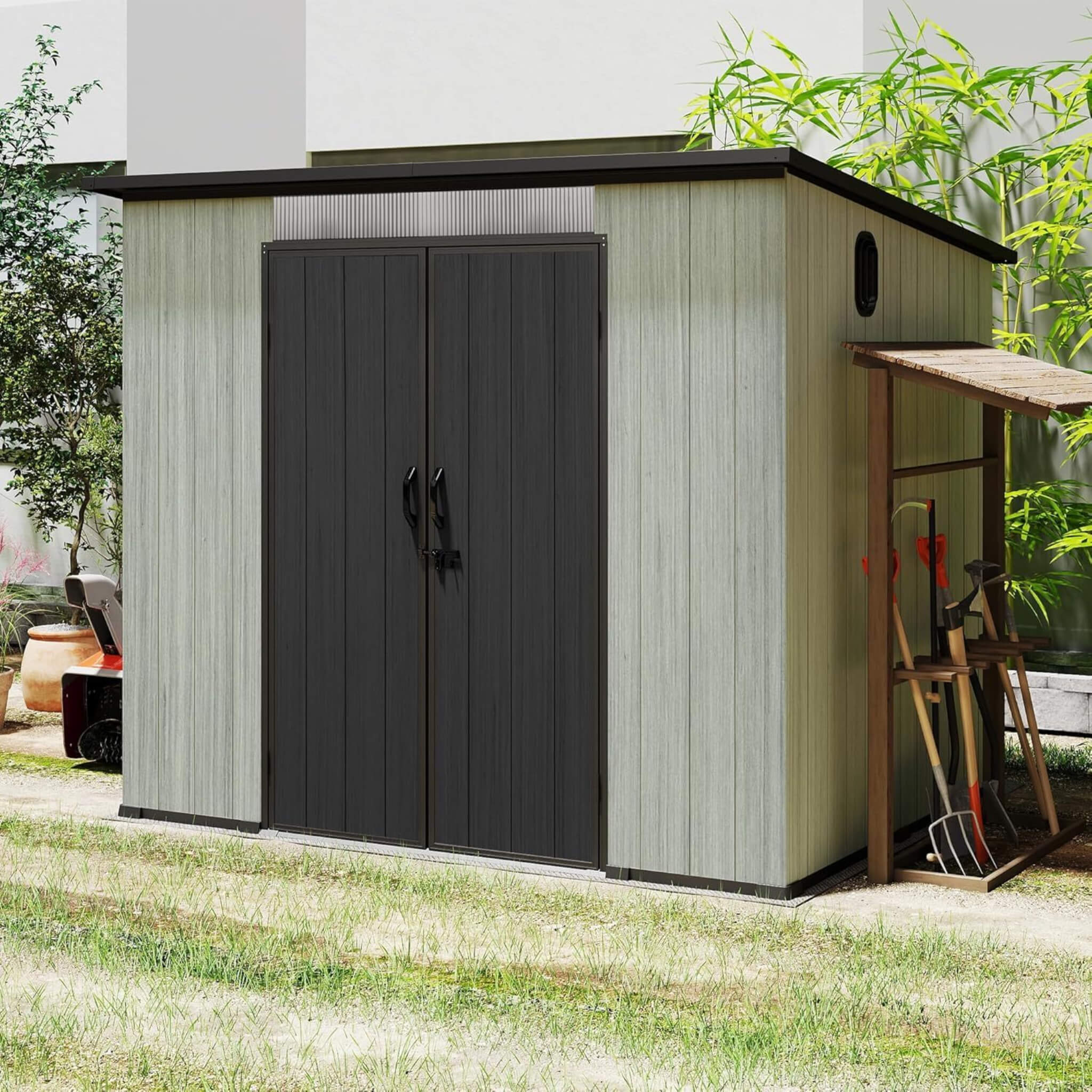 Alora outdoor resin storage shed featuring lockable double doors and a sloping roof, shown in an outdoor setting.