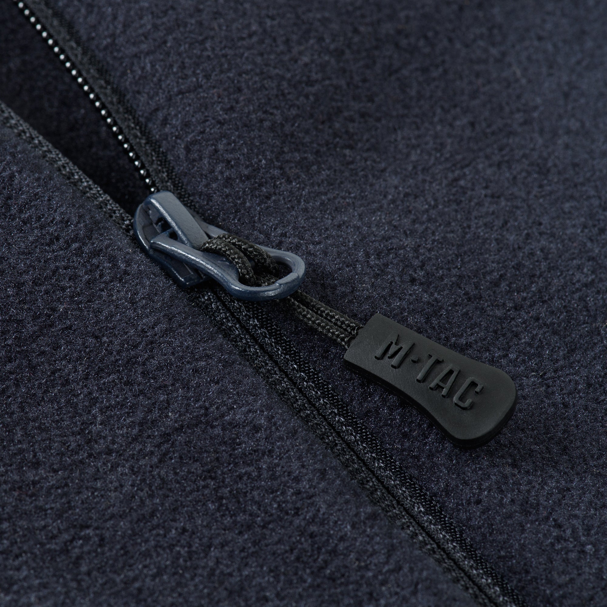 M-TAC fleece jacket made with Polartec fabric, featuring a sporty design and comfortable fit for outdoor activities.
