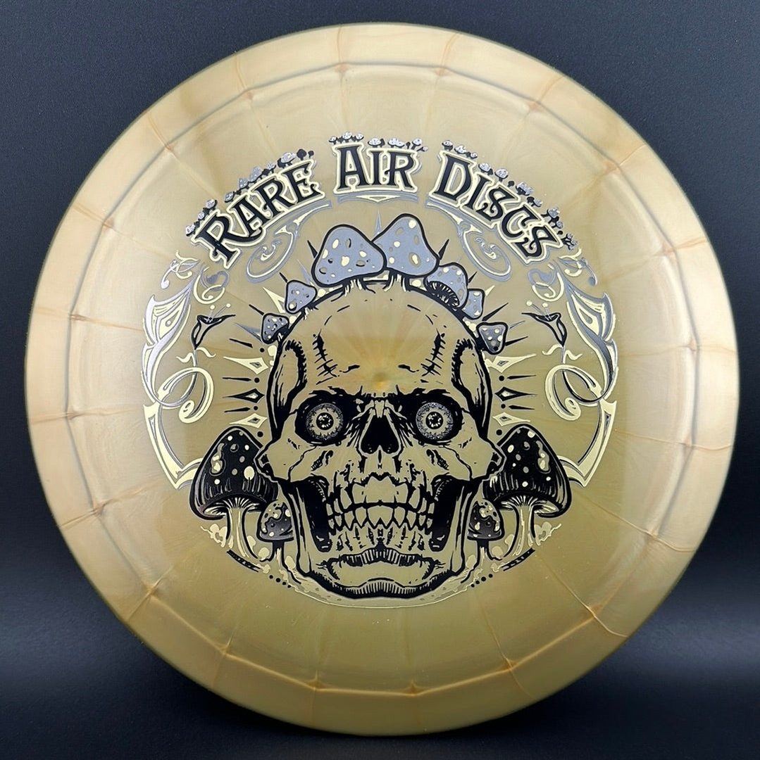 Ethereal Construct Crushin' Amanitas disc golf stamp by Manny Trujillo on rare air disc with vibrant, detailed design