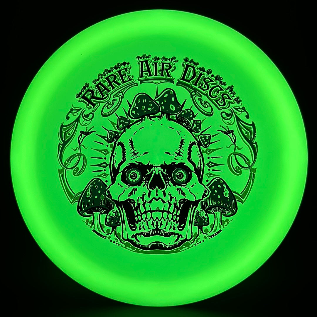 Forged Radiant Era Crushin' Amanitas disc golf stamp by Manny Trujillo on Rare Air Discs disc, featuring detailed mushroom artwork.