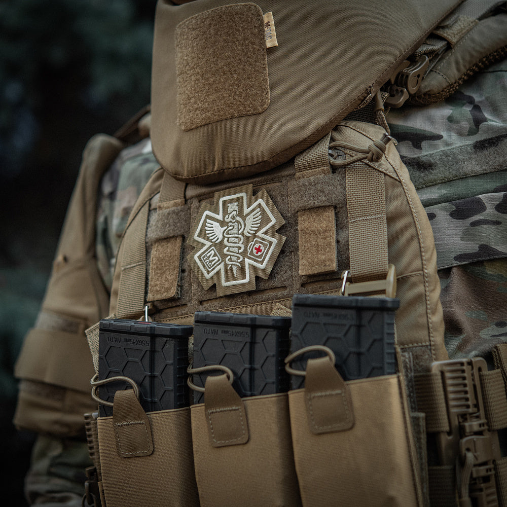 M-TAC Paramedic embroidered patch showing red cross design on a black background for uniforms and gear.