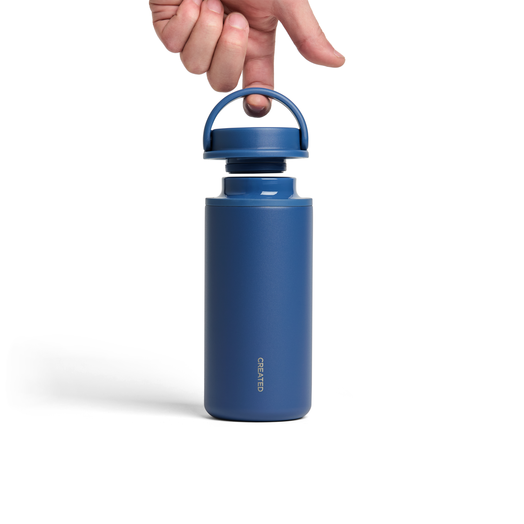 12oz Created Co. Nomad Grip Tumbler in Pacific Blue with textured grip and stainless steel finish, ideal for hot and cold drinks