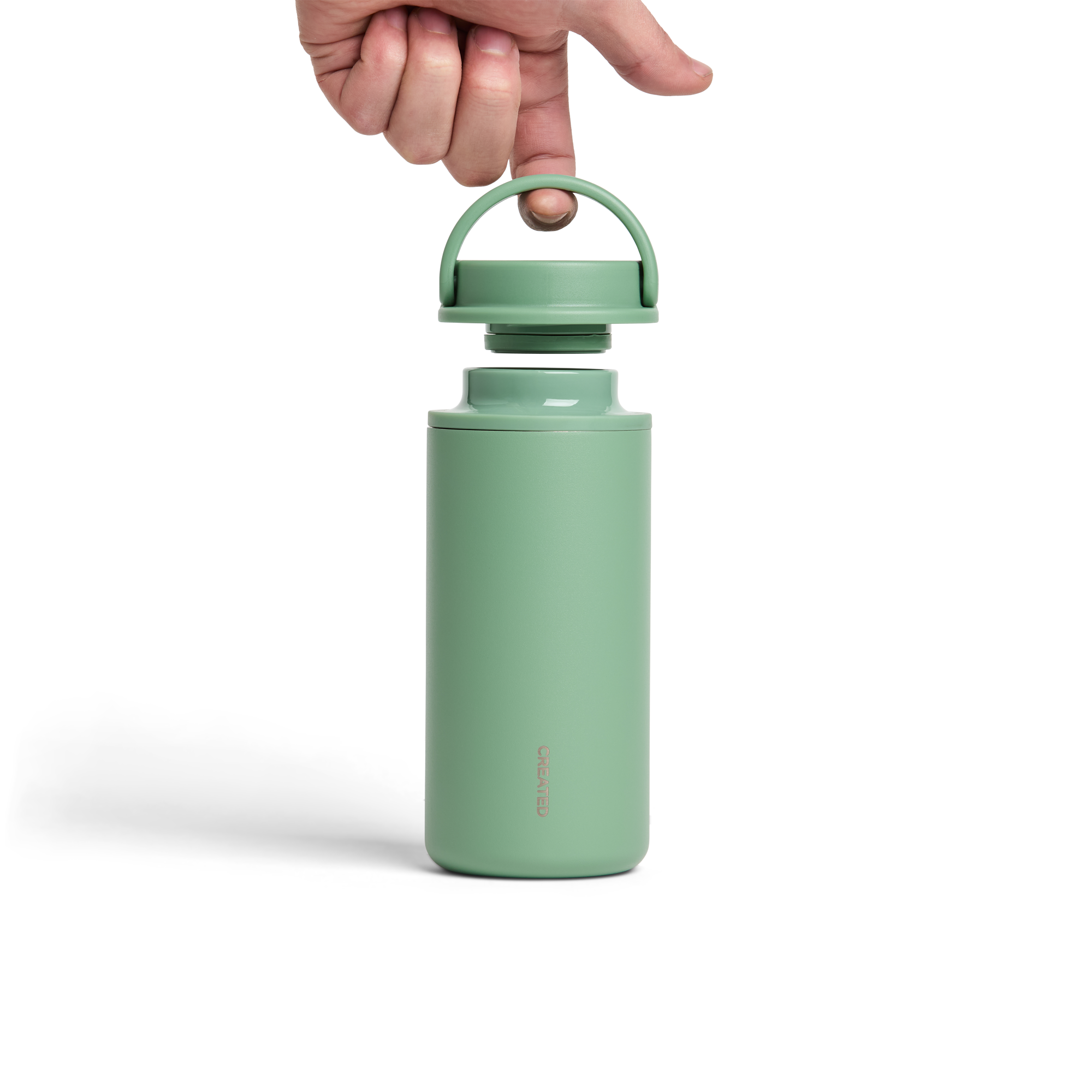 12oz Nomad Grip Tumbler in sage green by Created Co. with textured grip and stainless steel construction.