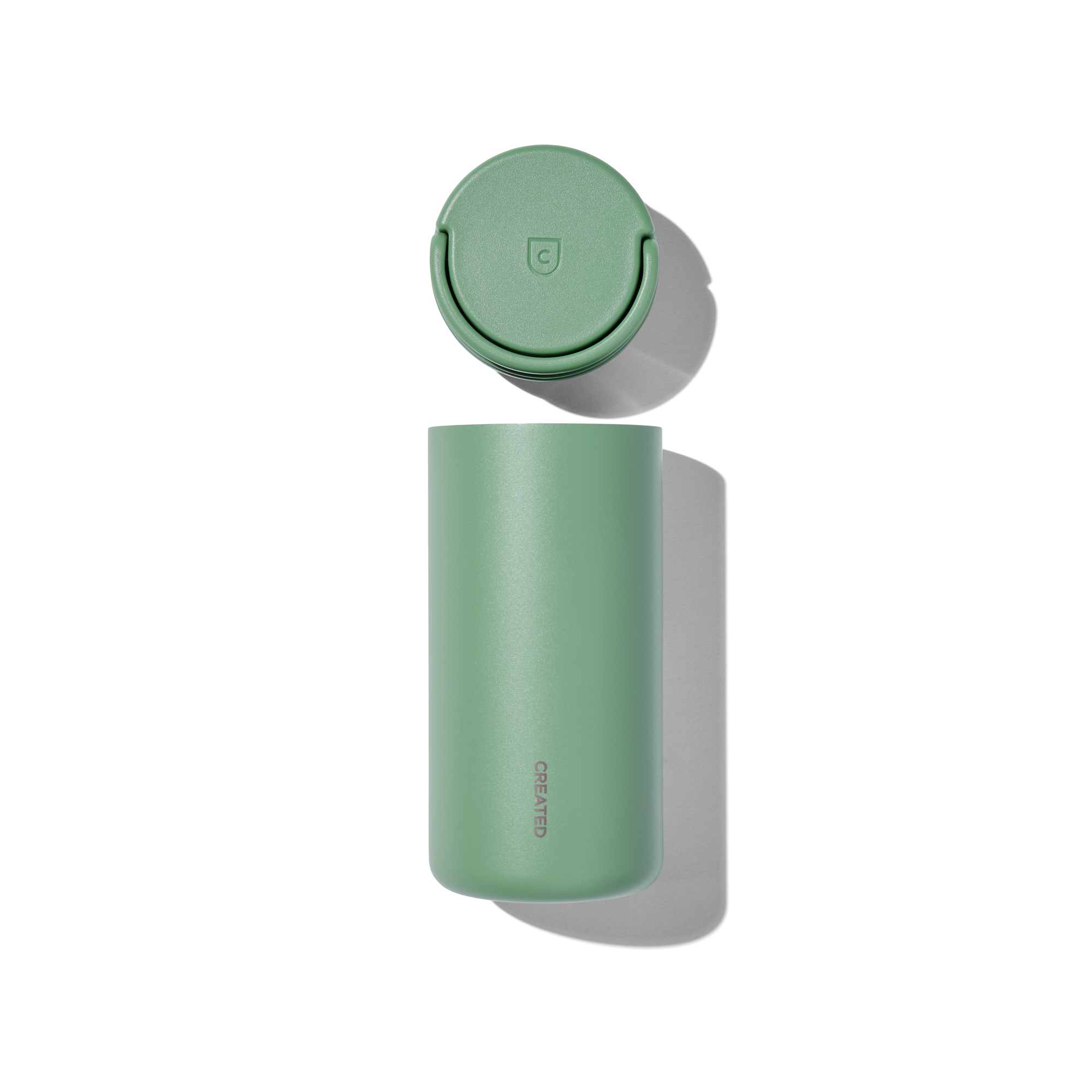 12oz Sage Green Nomad Grip Tumbler by Created Co. with textured grip and stainless steel interior, suitable for hot and cold drinks.