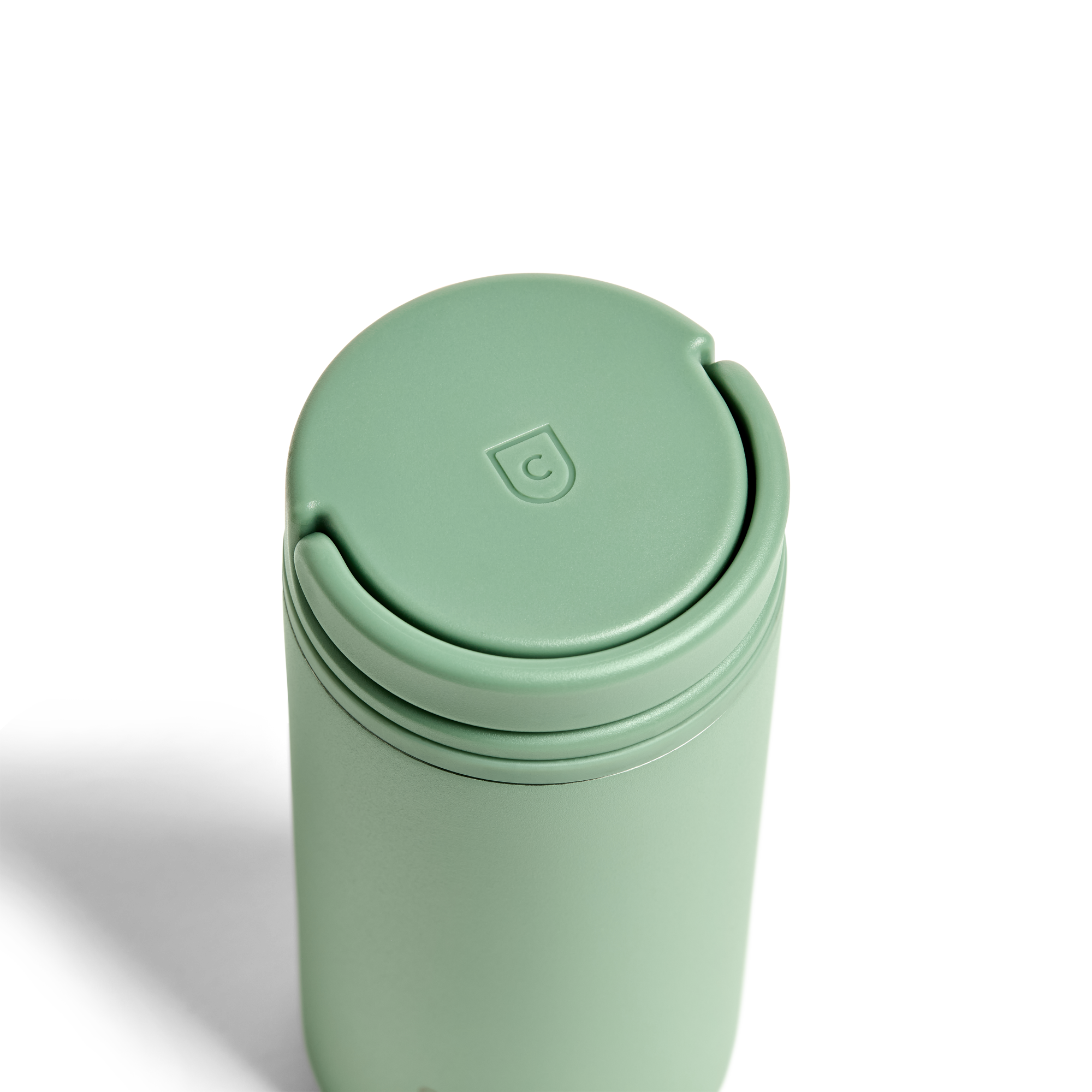 Created Co. 12oz Nomad Grip Tumbler in sage green with a textured grip, suitable for hot and cold beverages.