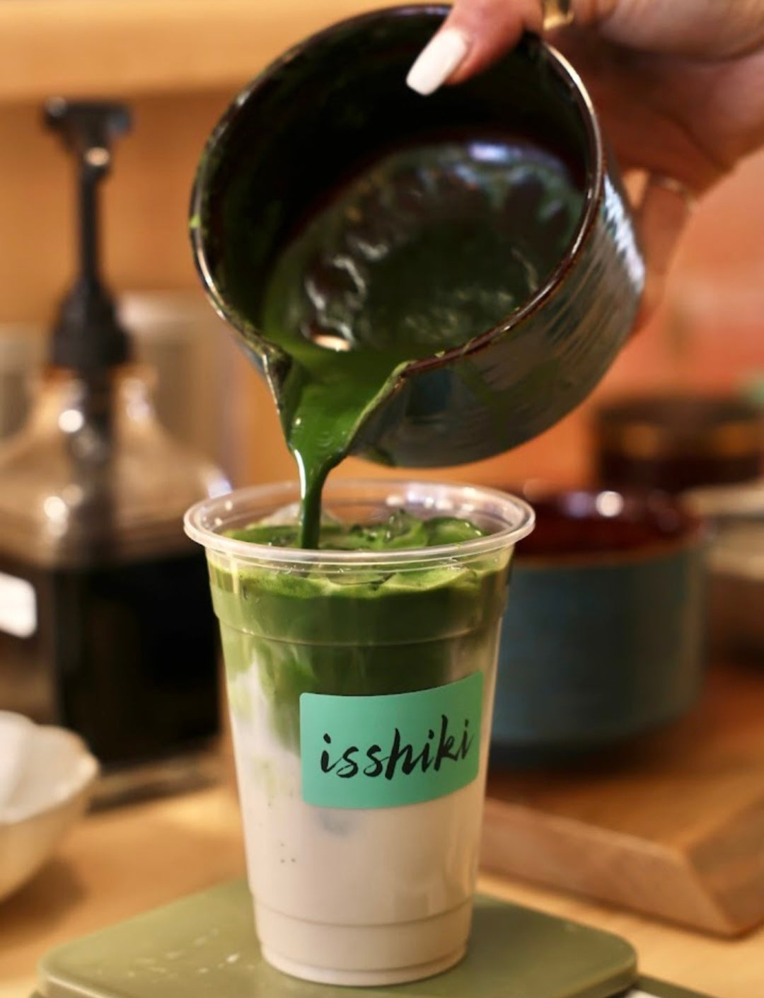 Fine green powder of Samidori single cultivar premium matcha from isshiki matcha, shown in a close-up image.