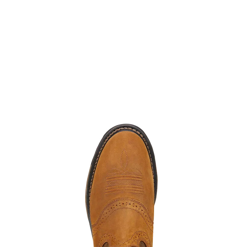 Tan leather boot with black sole on a beige background