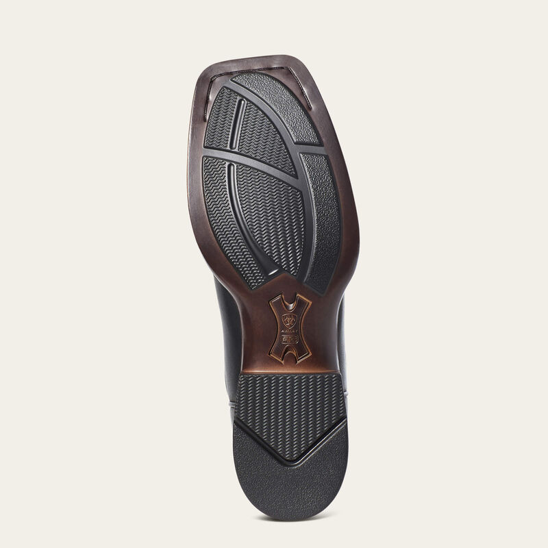 A pair of black Ariat women's Western boots with leather soles, featuring detailed stitching and classic Western style.