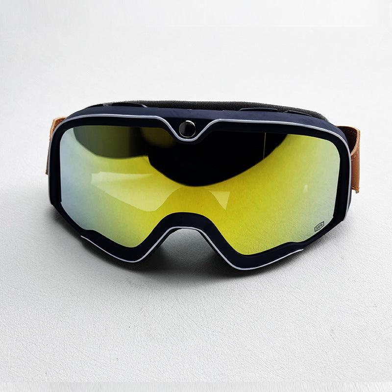 Bean's Moto Booth 100% Barstow motorcycle goggles with tinted lenses and adjustable strap, designed for helmet use.