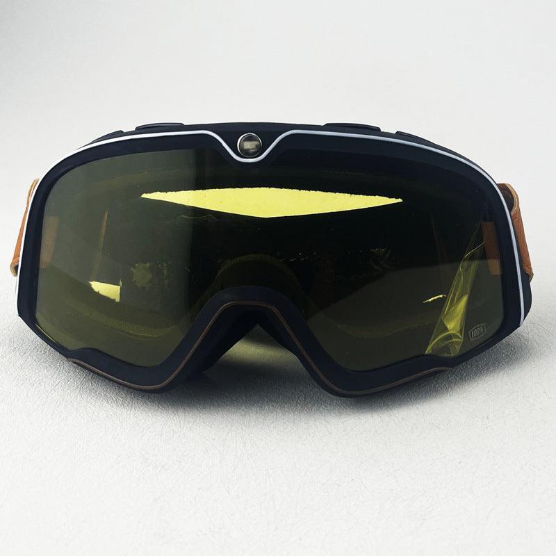 Bean's Moto Booth 100% BARSTOW™ motorcycle goggles with clear lenses and adjustable straps, designed for helmet use.