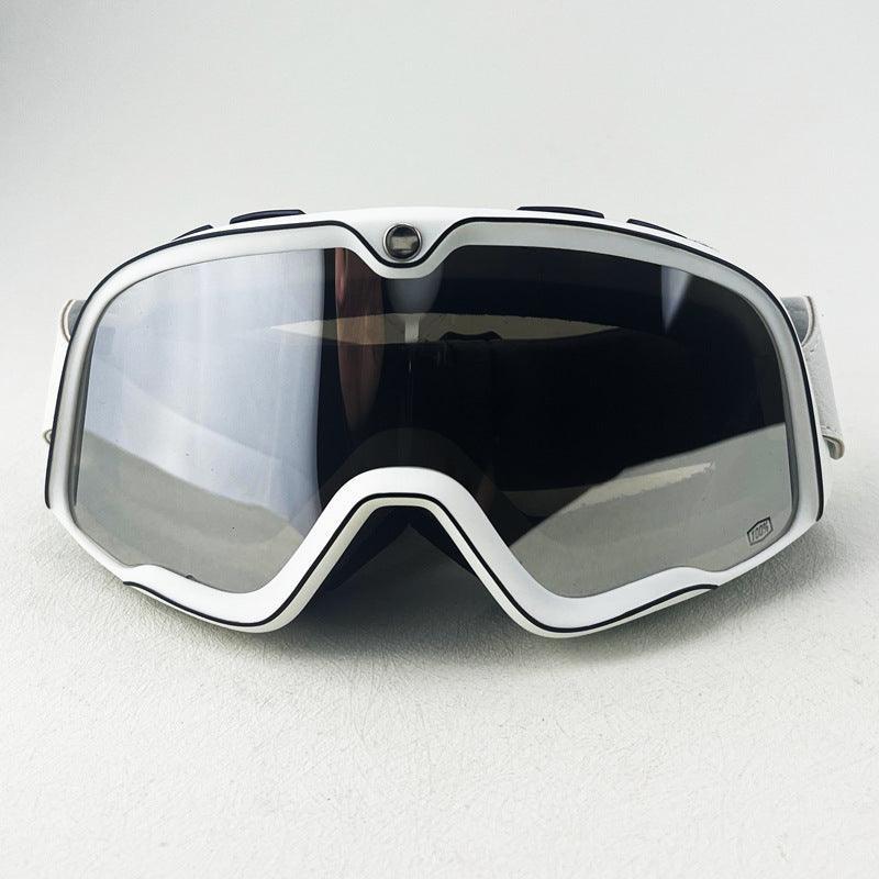 Bean's Moto Booth 100% Barstow motorcycle goggles with clear lens and adjustable strap, designed for helmet use.