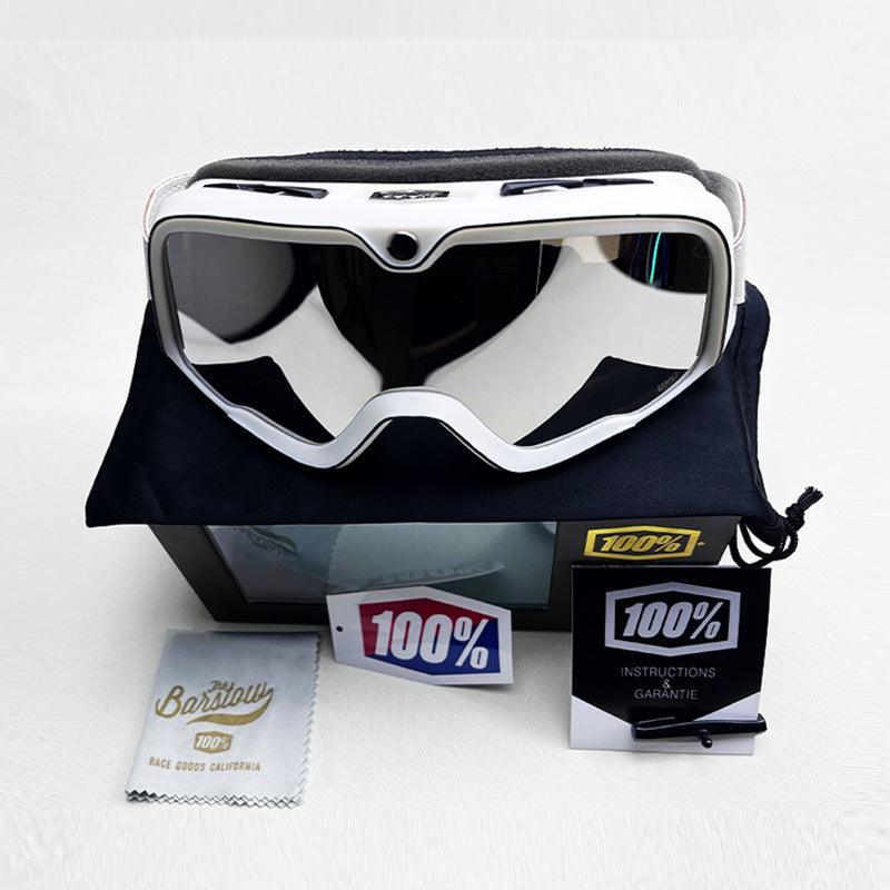 Bean's Moto Booth 100% BARSTOW™ motorcycle goggles with clear lens and black frame, designed for helmet use and rider protection.