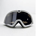 Bean's Moto Booth 100% BARSTOW™ motorcycle goggles with clear lenses and black frame, designed for helmet use.