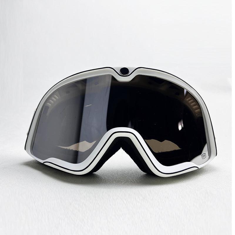 Bean's Moto Booth 100% BARSTOW™ motorcycle goggles with clear lenses and black frame, designed for helmet use.