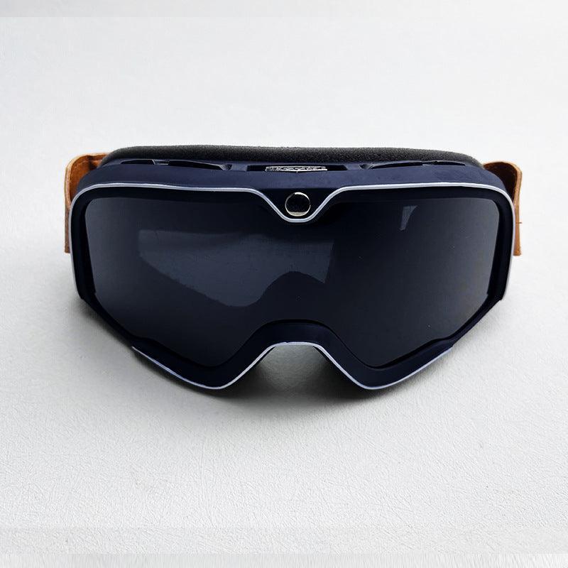 Bean's Moto Booth 100% BARSTOW™ motorcycle goggles with tinted lenses and adjustable strap, designed for helmet use.