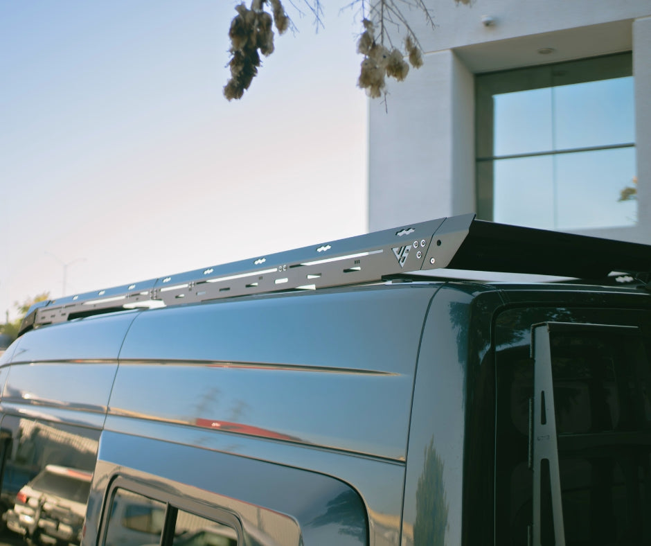 Sprinter Scout Rack 144 by The Van Mart, featuring a sturdy design for secure cargo storage on a van roof.