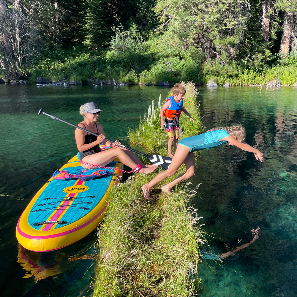 Vamo Life full coil SUP paddleboard leash in pink and wood finish, designed to match BOTE, YOLO, ISUP, iRocker, and Aquaglide paddleboards.