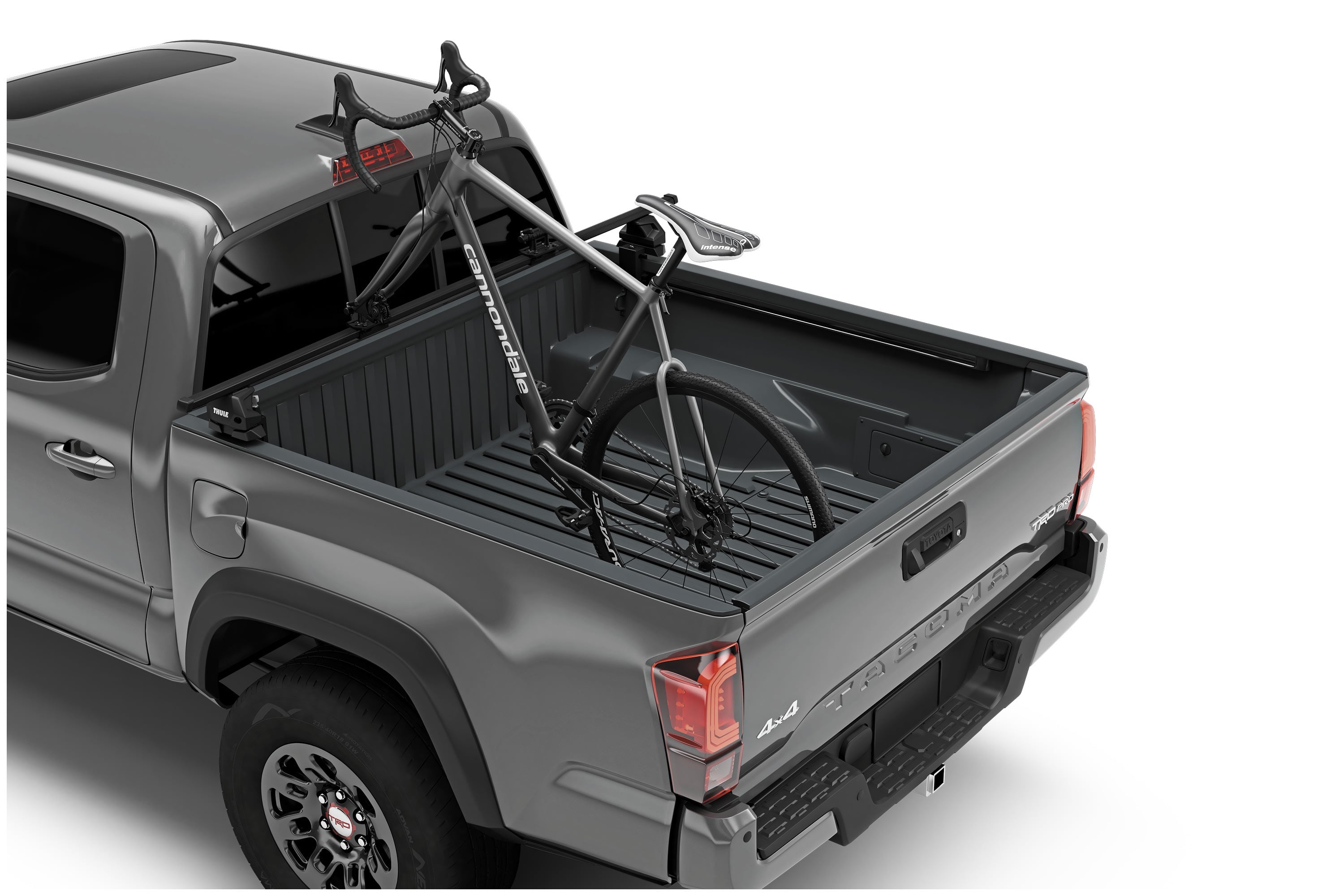 Backcountry Sportsman Thule Bed Rider Pro Compact bike rack mounted on a truck bed for secure bike transport.