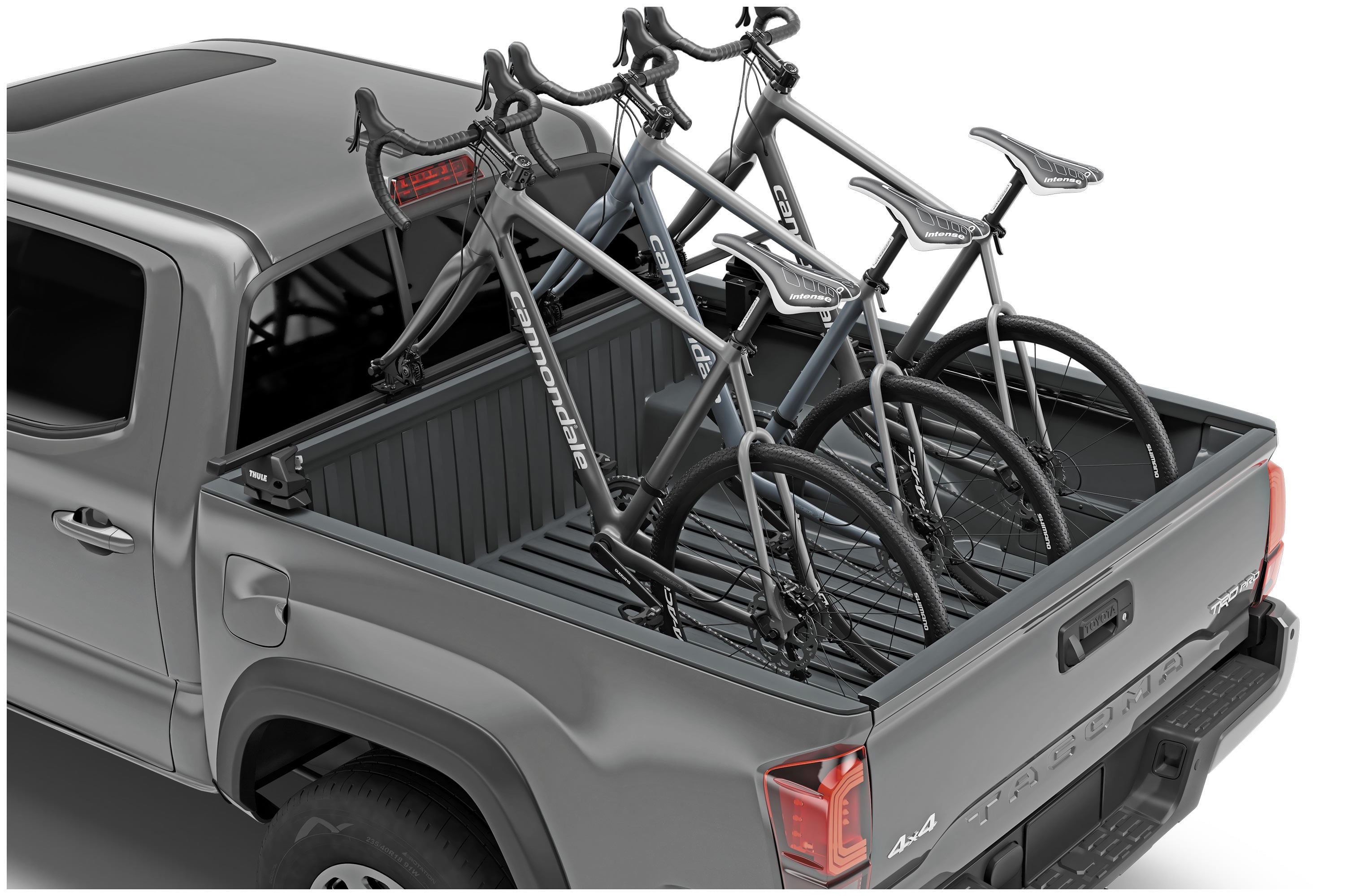 Backcountry Sportsman Thule Bed Rider Pro Add-On Block for bike racks, shown mounted on a truck bed for secure bike transport.