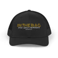 In The Bag Disc Golf Company trucker cap featuring a mesh back and logo embroidery, casual headwear for disc golf enthusiasts.