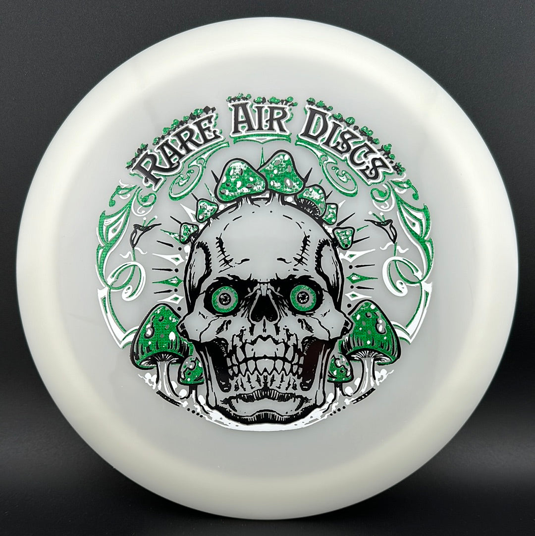 Forged Radiant Era Crushin' Amanitas disc golf stamp by Manny Trujillo on Rare Air Discs disc golf disc with vibrant design.