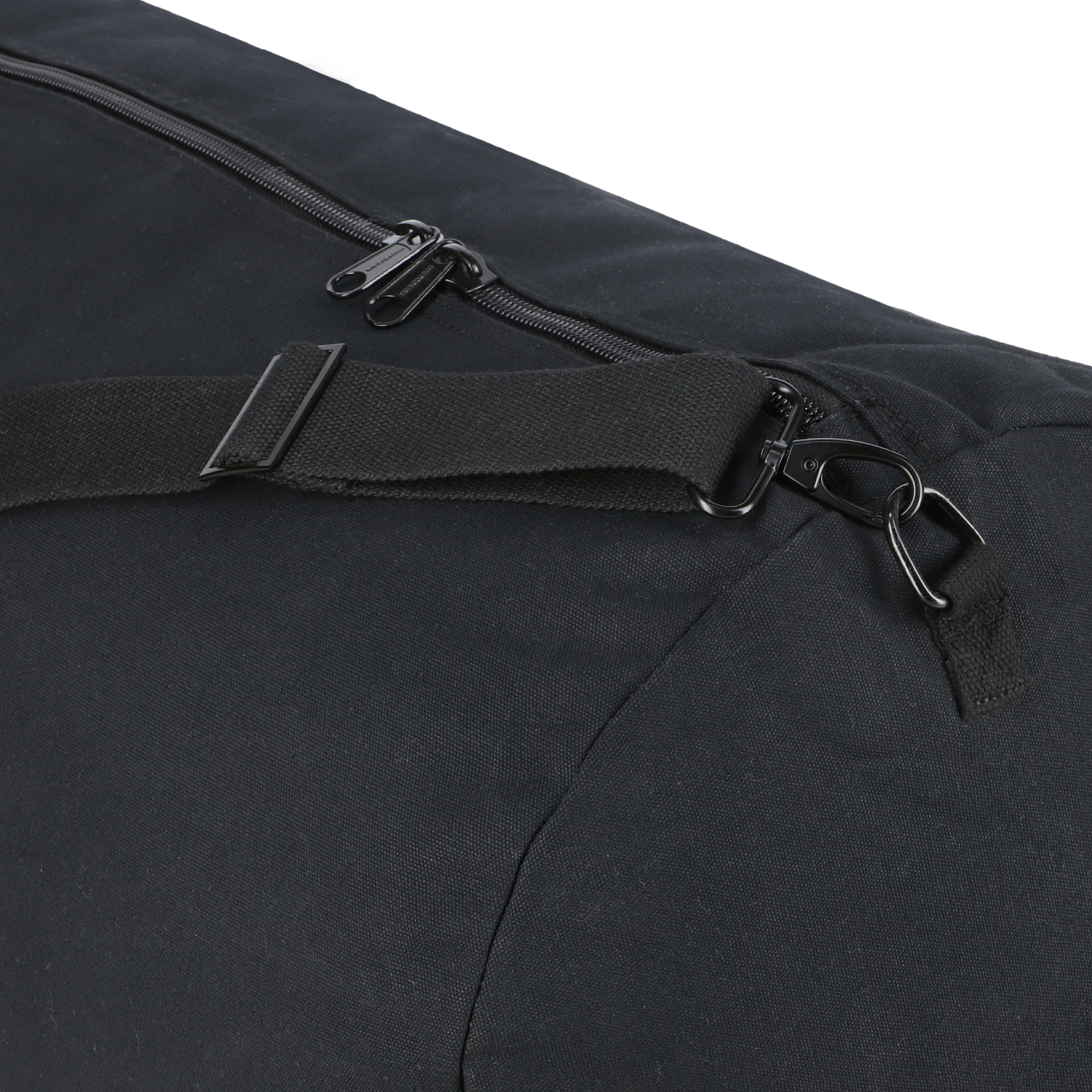 White Duck Outdoors Hoplite Canvas Duffel Bag with sturdy handles and spacious interior for travel or gym use.