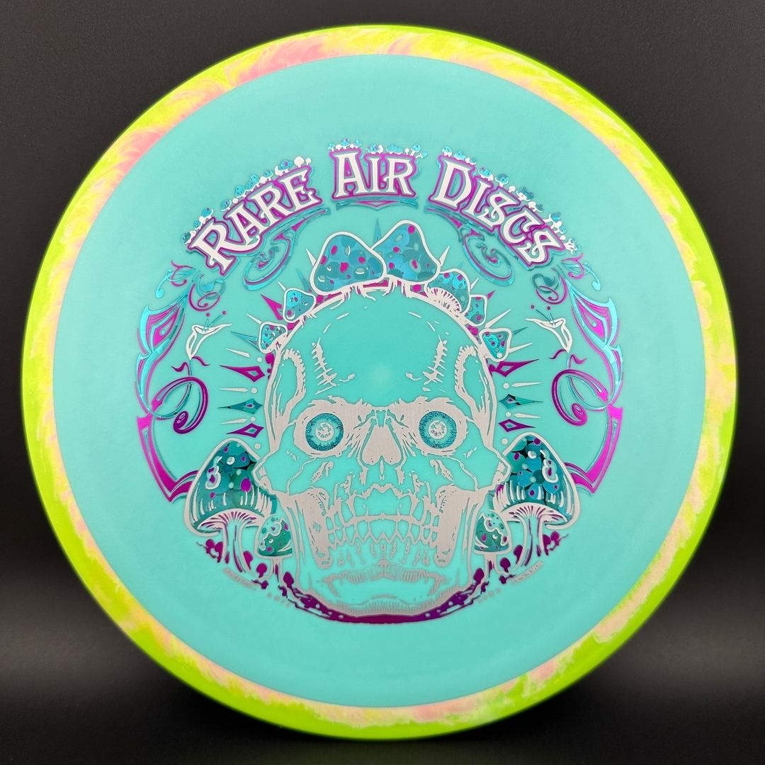Fission Defy Crushin' Amanitas VIP 2.0 disc golf disc by Rare Air Discs, featuring vibrant artwork and durable plastic.