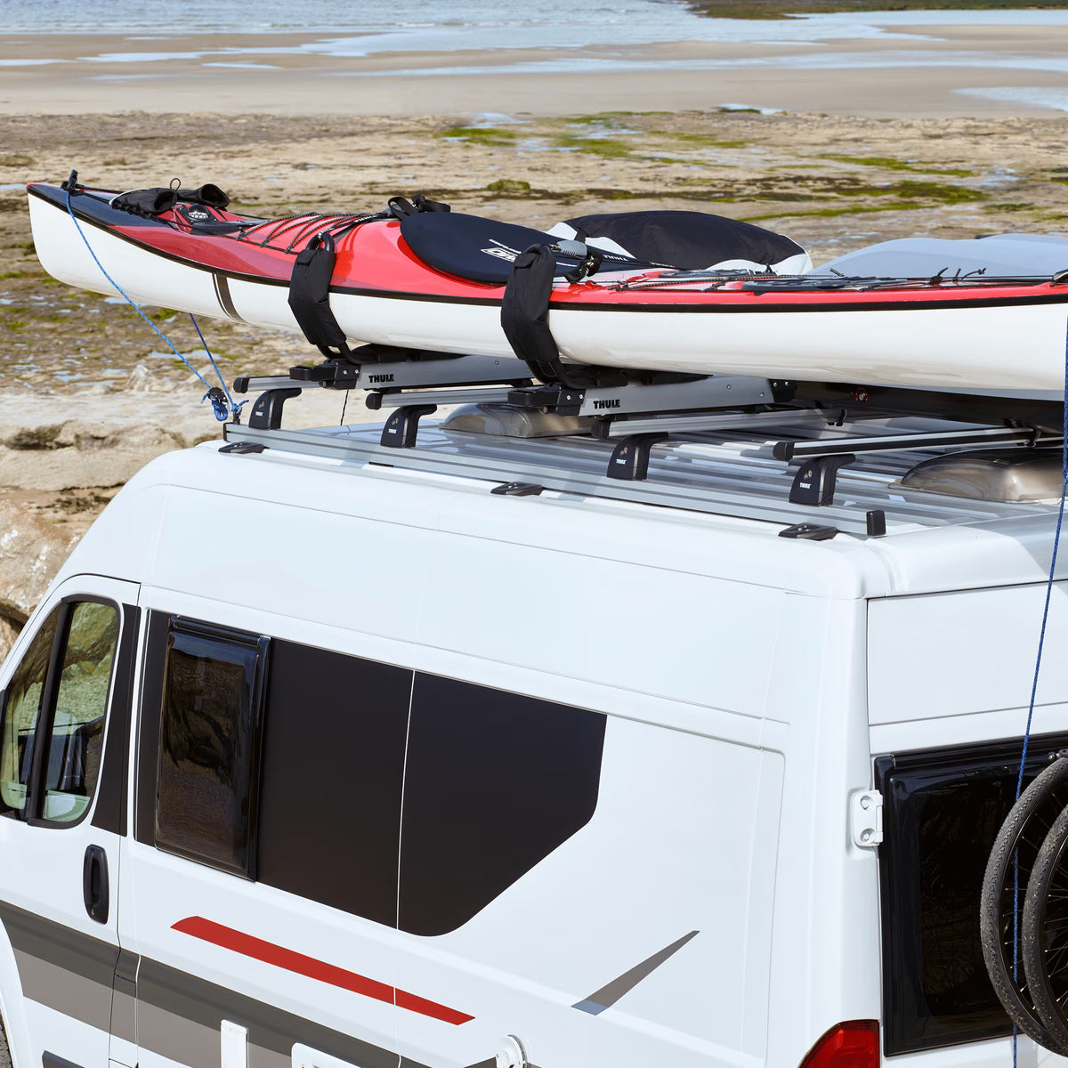 Backcountry Sportsman Thule Hullavator Pro winter and water sport rack mounted on vehicle roof with kayak and gear