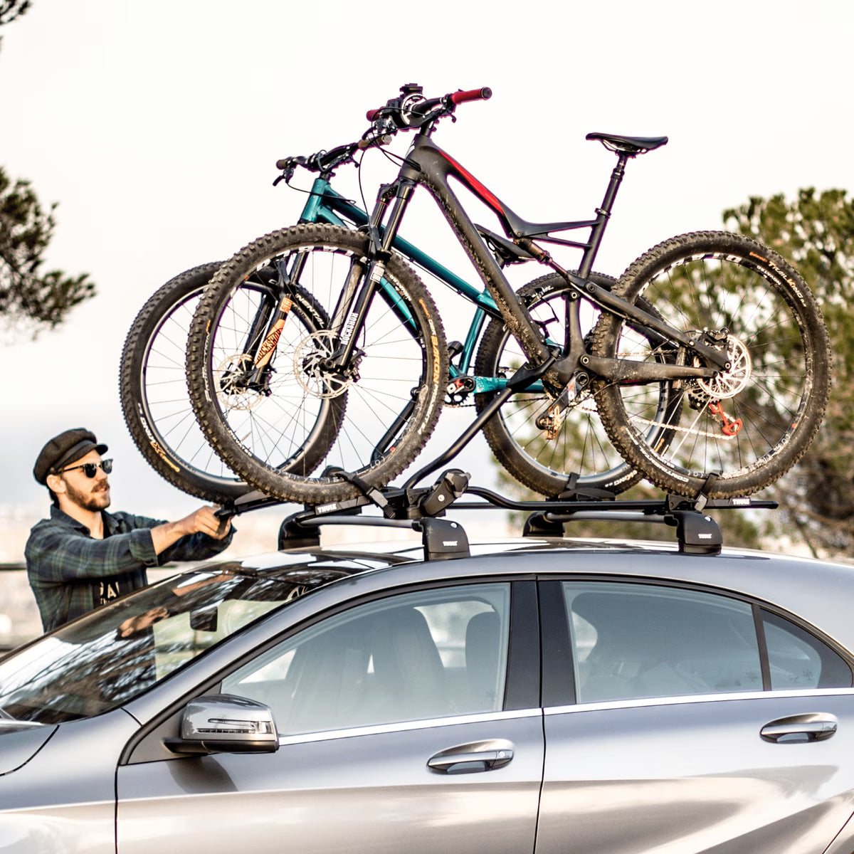Backcountry Sportsman Thule ProRide XT bike rack mounted on a vehicle, showing its sturdy design and secure bike holding features.