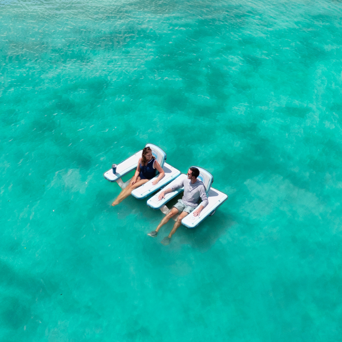iROCKER US floating chair with comfortable seating and sturdy design, ideal for relaxing on water.