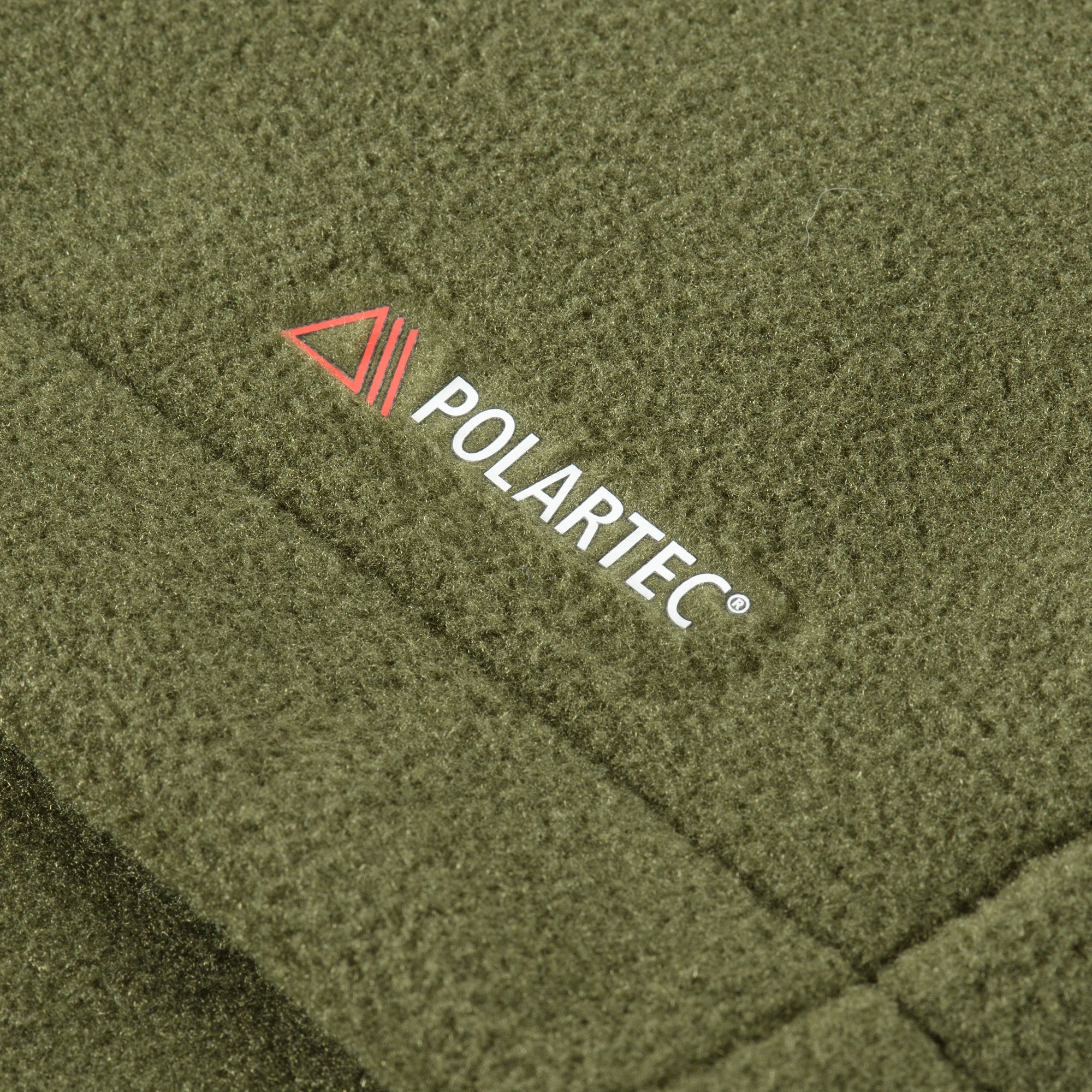 M-TAC Nord Polartec fleece jacket in dark color, showcasing soft texture and functional design for outdoor activities.