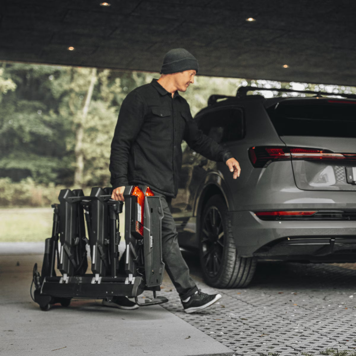 Backcountry Sportsman Thule Epos bike rack mounted on a vehicle, showcasing durable design for secure bike transport.