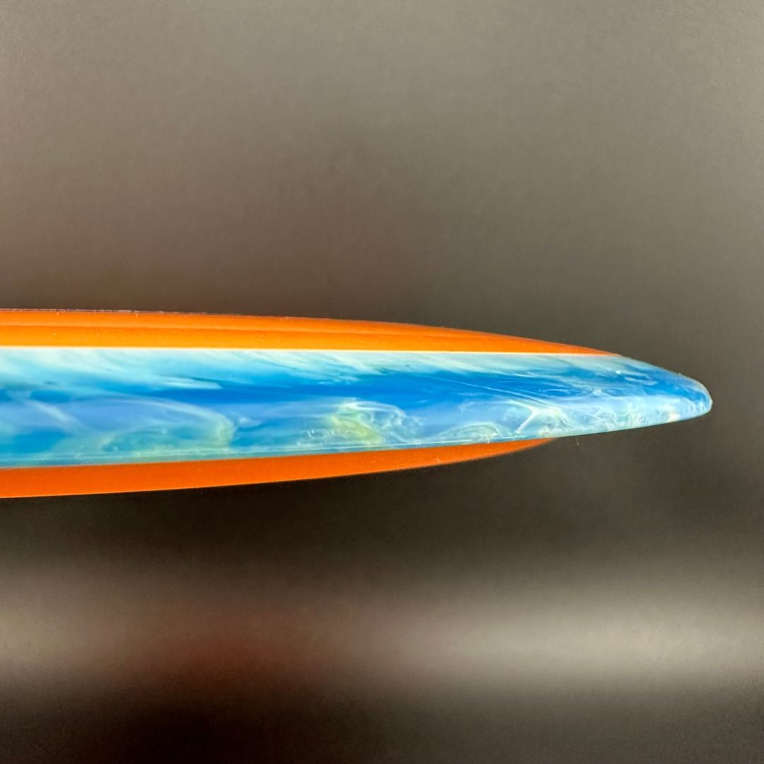 Rare Air Discs Fission Defy Crushin' Amanitas VIP 2.0 disc golf disc with vibrant design and bold branding on the flight surface.