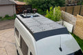 Orion Van Gear Sprinter Roof Deck Panels 2.0 with flush design installed on van roof, showcasing durable roof rack and panel setup.