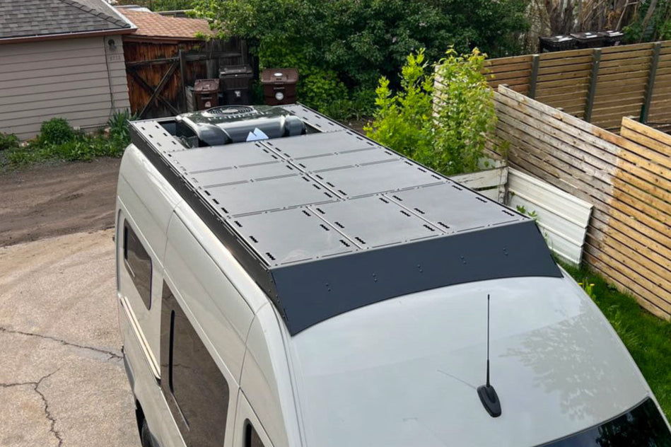 Orion Van Gear Sprinter Roof Deck Panels 2.0 with flush design installed on van roof, showcasing durable roof rack and panel setup.