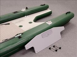 Backcountry Sportsman FishSkiff™ inflatable fishing boat with two-person swivel seat and canopy, shown on water.