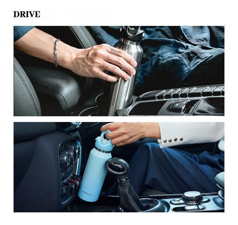Bean's Moto Booth REVOMAX™ motorcycle travel thermos with one-handed opening, stainless steel body, and ergonomic design.