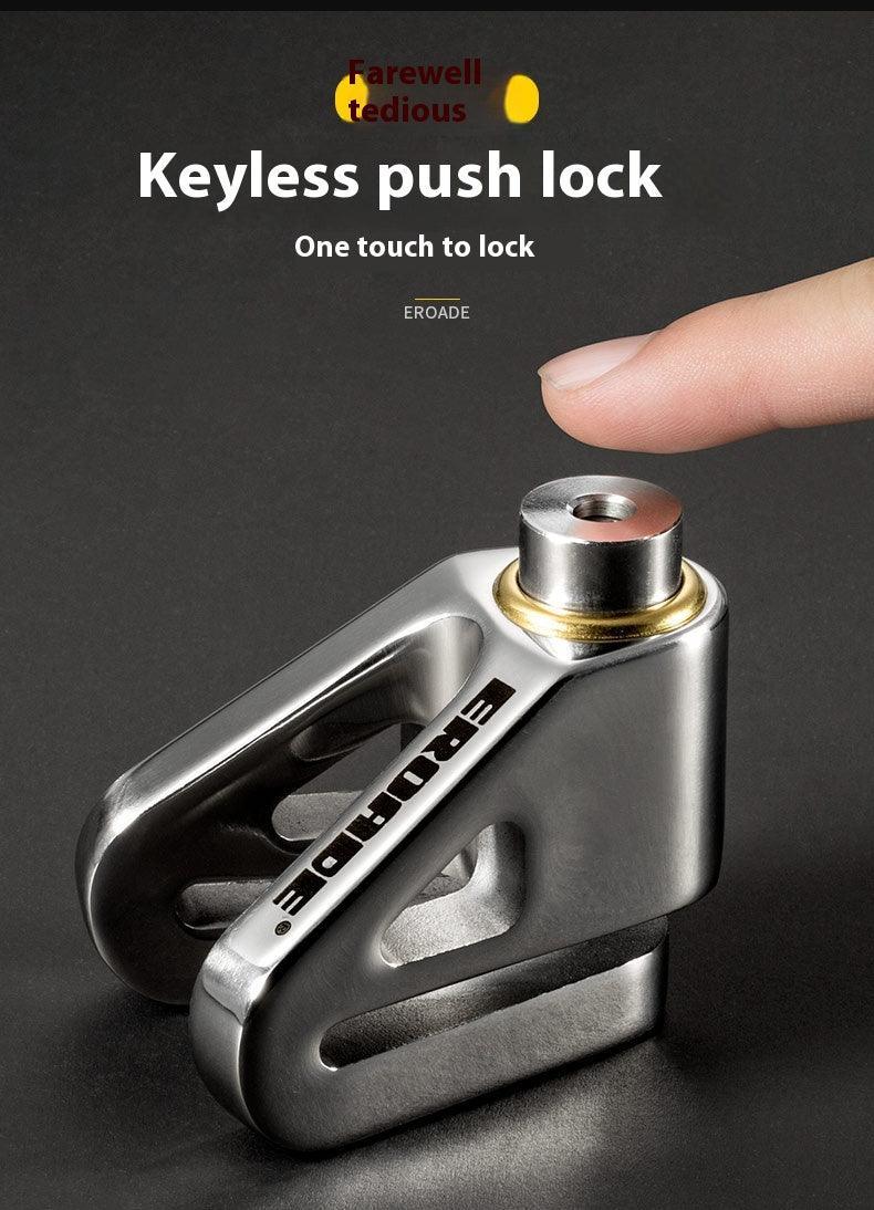 Bean's Moto Booth EROADE™ motorcycle disc brake lock with key, silver color, mounted on a motorcycle brake disc for security.
